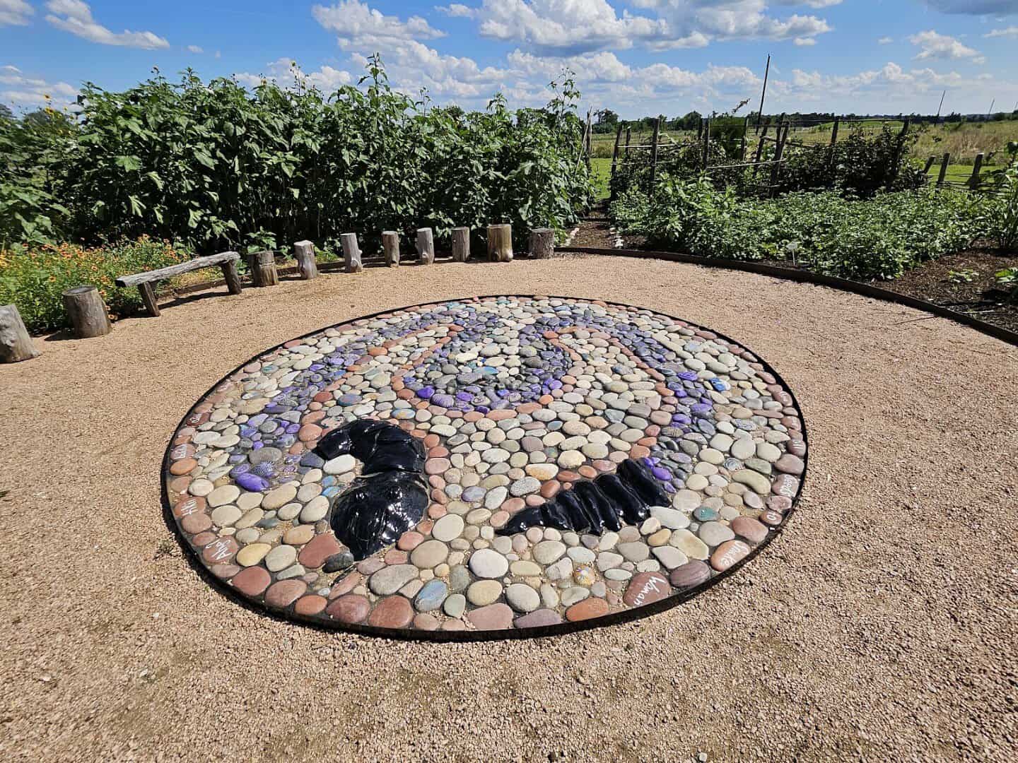 Stone snake mosaic in Snake Woman's Garden at Caddo Mounds State Historic Site