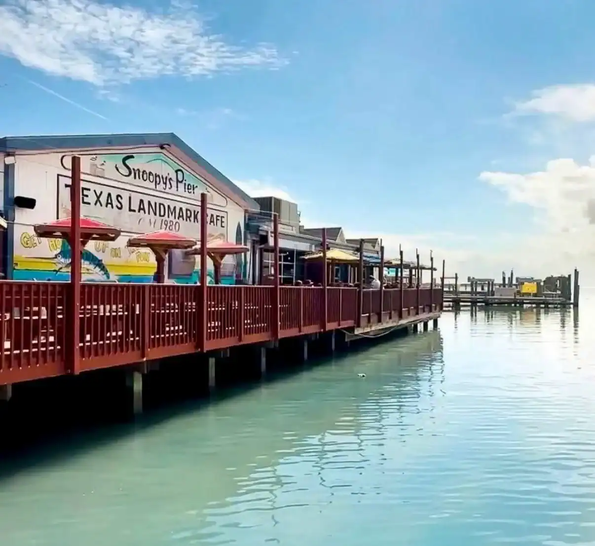 Snoopy's Pier stretching over the water in Corpus Christi