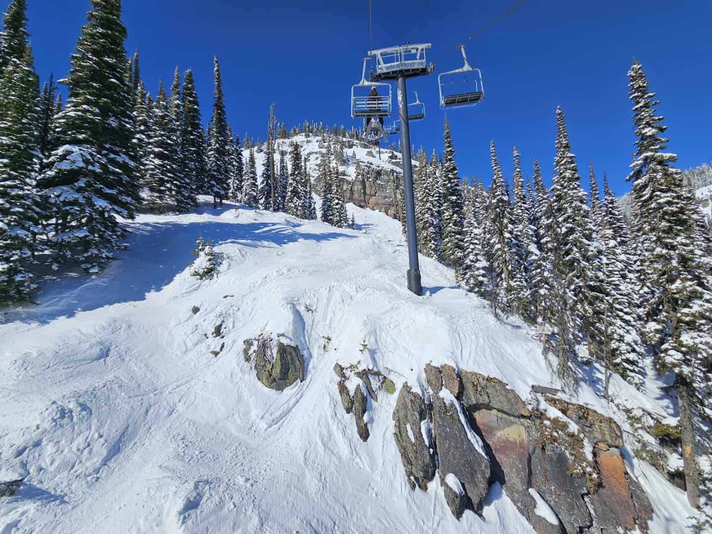 Snow ghosts and a chairlift on the frosted slopes of Whitefish Mountain Resort, Whitefish, Montana
