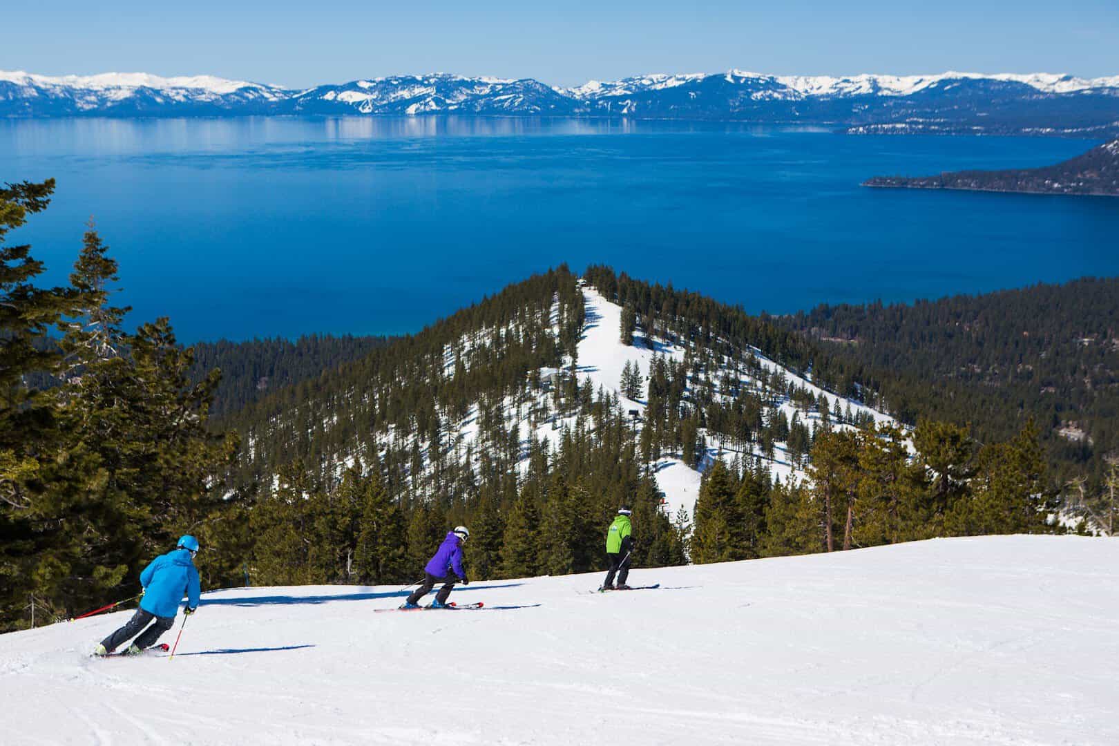 A snow-covered ski run at Diamond Peak overlooking blue Lake Tahoe, Incline Village, Nevada
