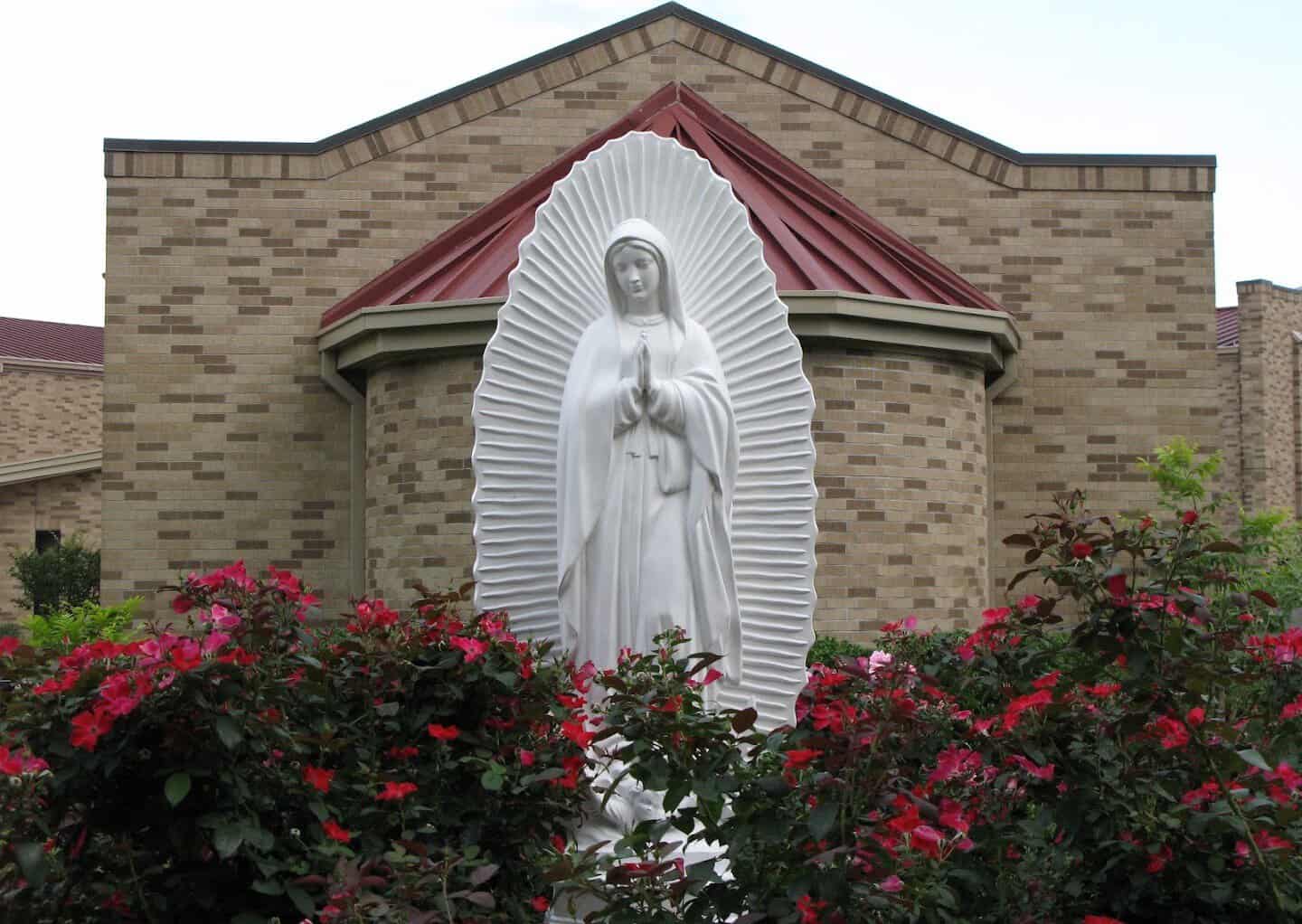 Our Lady of Guadalupe grotto set into the brick wall at St. Anthony Catholic Church in Bryan