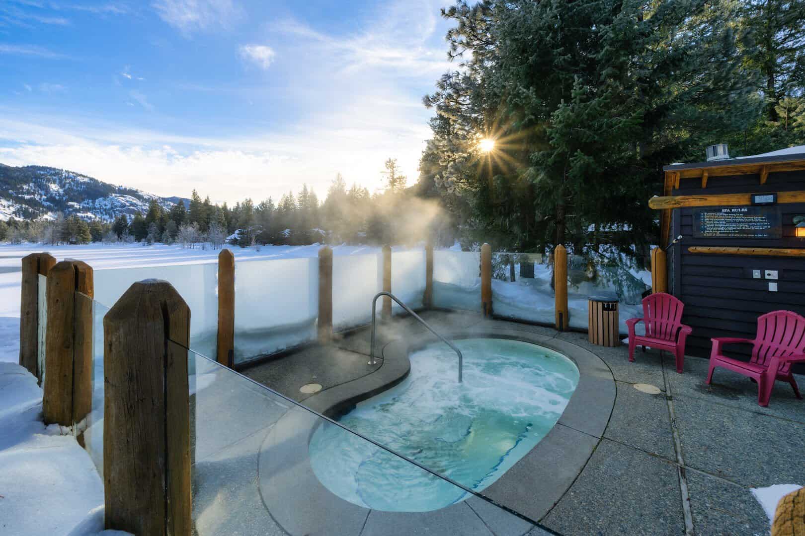 Steaming outdoor hot tub in the snow at Freestone Inn, Mazama, Washington