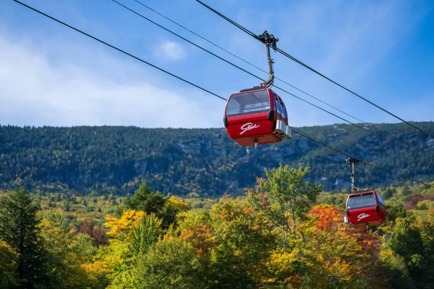 Stowe gondolas over autumn foliage on Mount Mansfield, Stowe, Vermont
