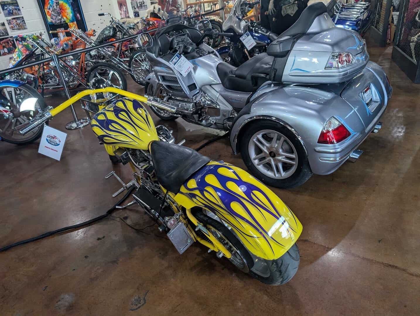 Custom yellow motorcycle on display at Strokers Dallas