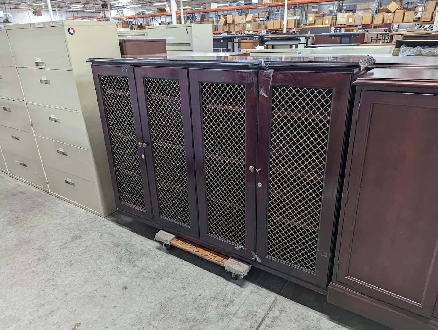 Surplus wooden cabinets and furniture priced for sale at the State Surplus Store in Austin