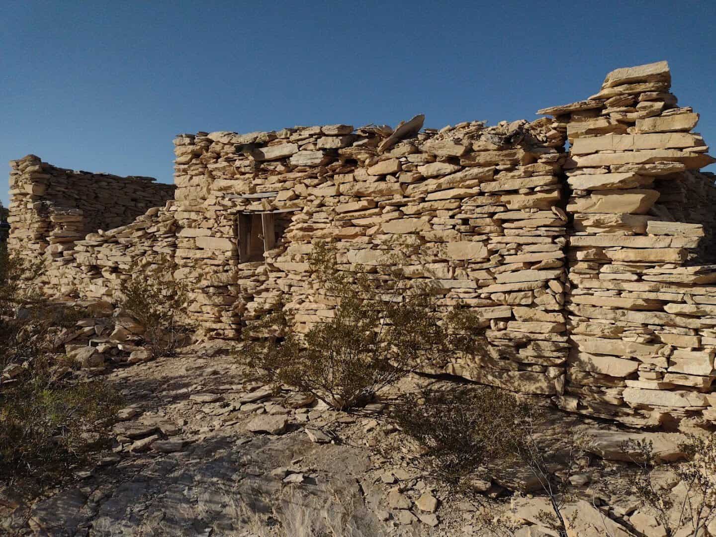 Crumbling stone ruins of a building at Terlingua Ghost Town near Big Bend, Texas