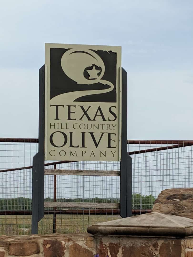 Texas Hill Country Olive Co. sign in Dripping Springs