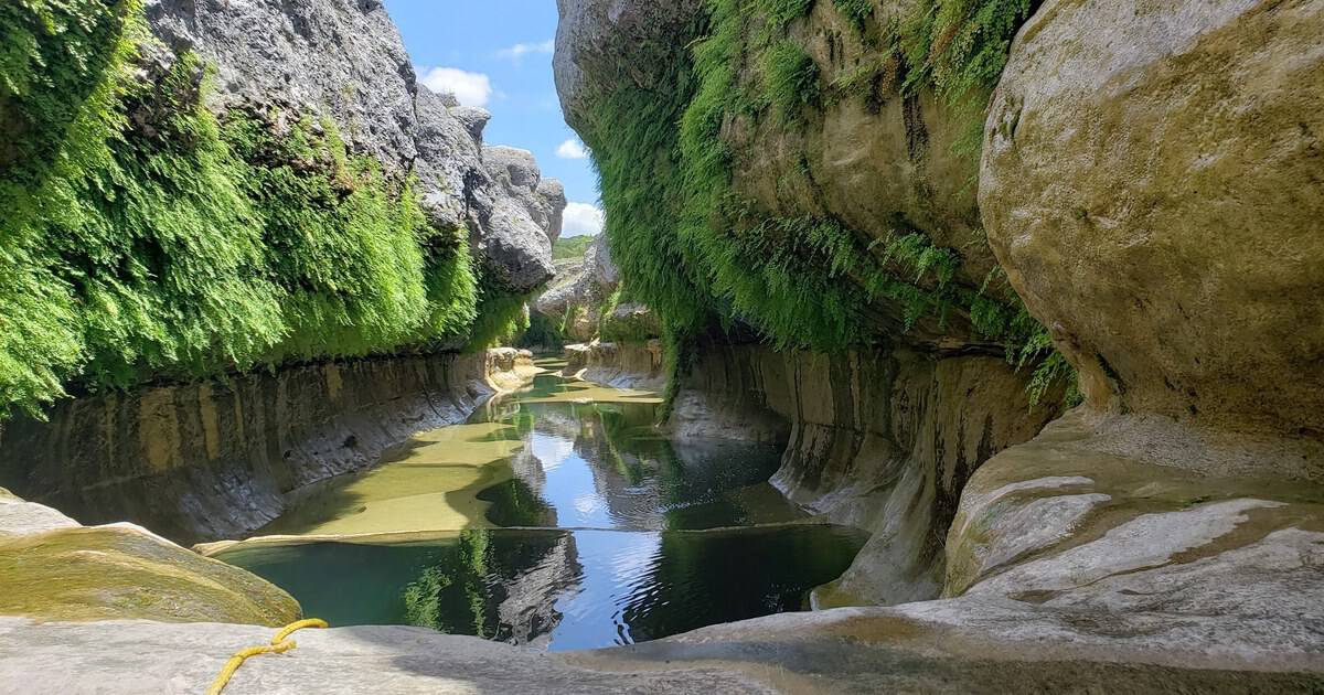 This Secret Texas Slot Canyon Is a Spring-Fed Swimming Hole Worth a 14-Mile Hike
