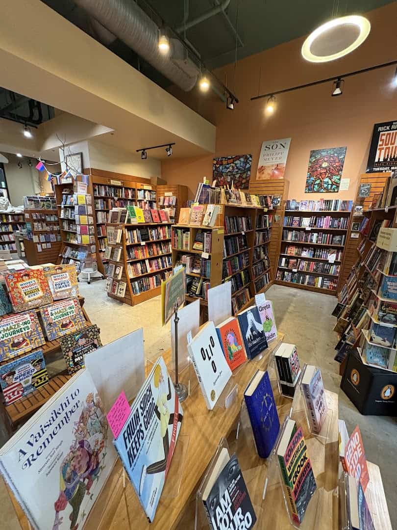 Interior of The Twig Book Shop with book display tables and shelves in San Antonio