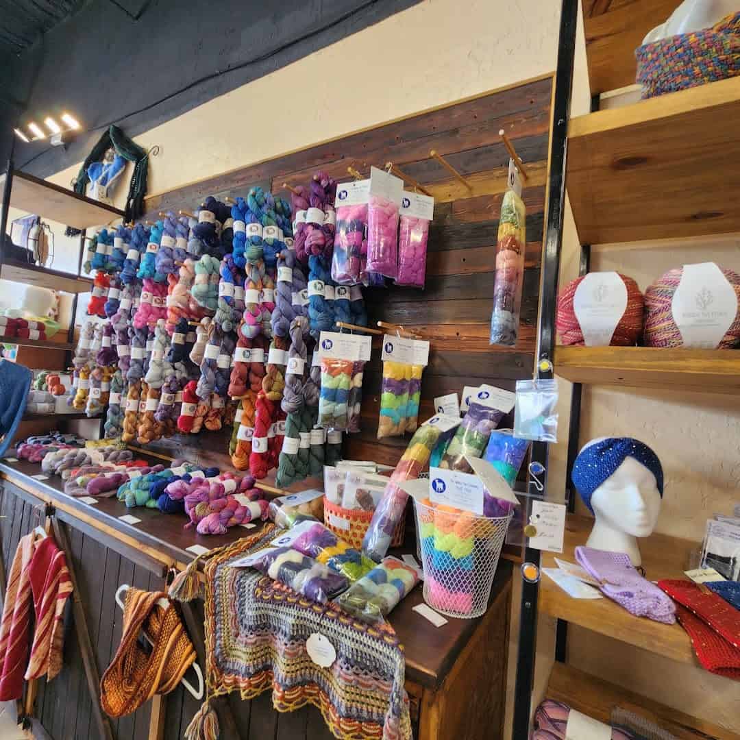A tall display stacked with colorful yarn at Lone Star Yarn in Bedford, Texas