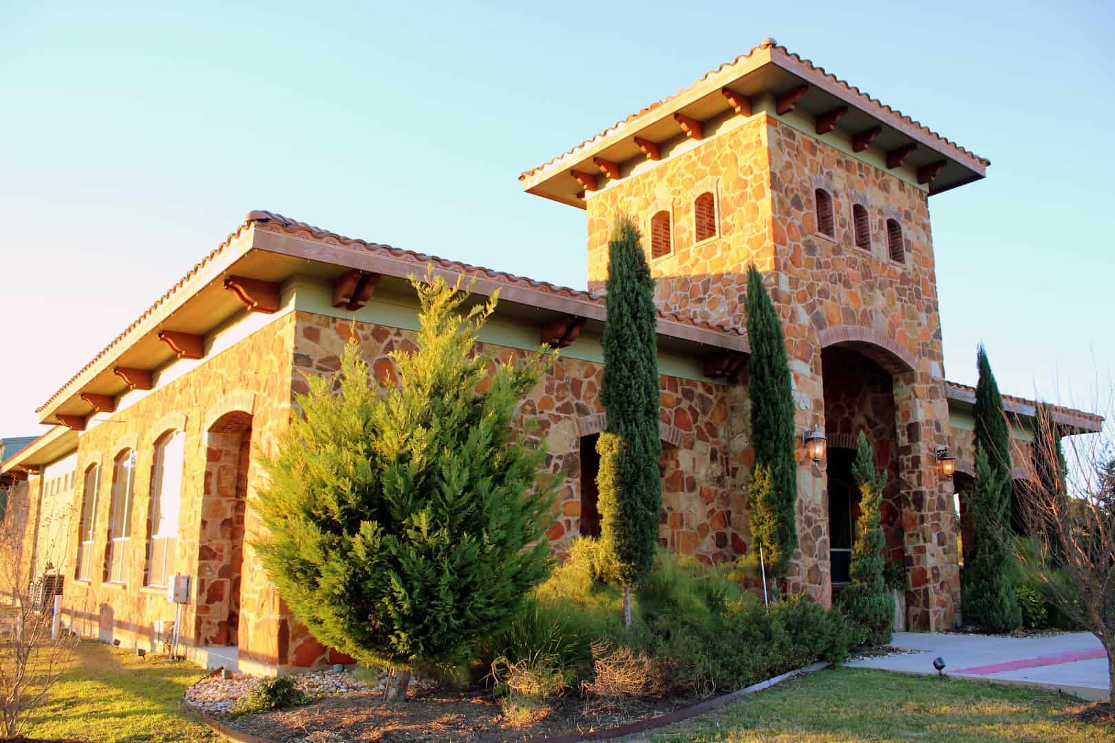 Tuscan-style mill and tasting building at Texas Hill Country Olive Co.