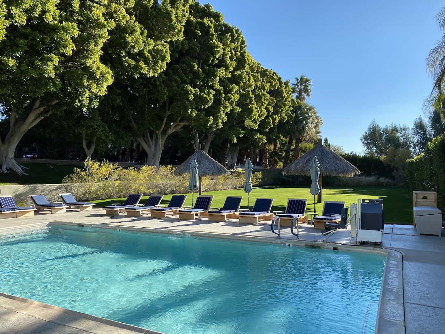 Palm-lined mineral pool at Two Bunch Palms in Desert Hot Springs, California
