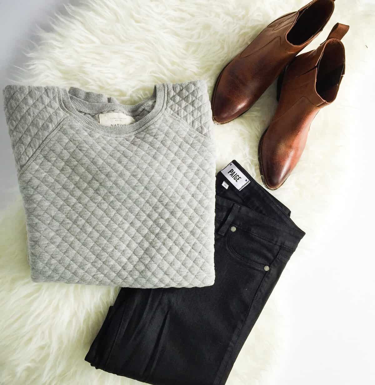 Gray tee, black jeans and boots styled at Uptown Cheapskate Tyler