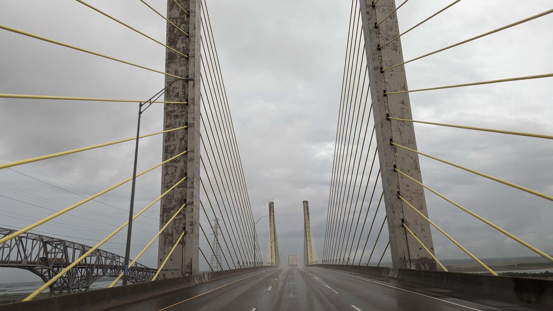 Driving over the cable-stayed Veterans Memorial Bridge beside the Rainbow Bridge