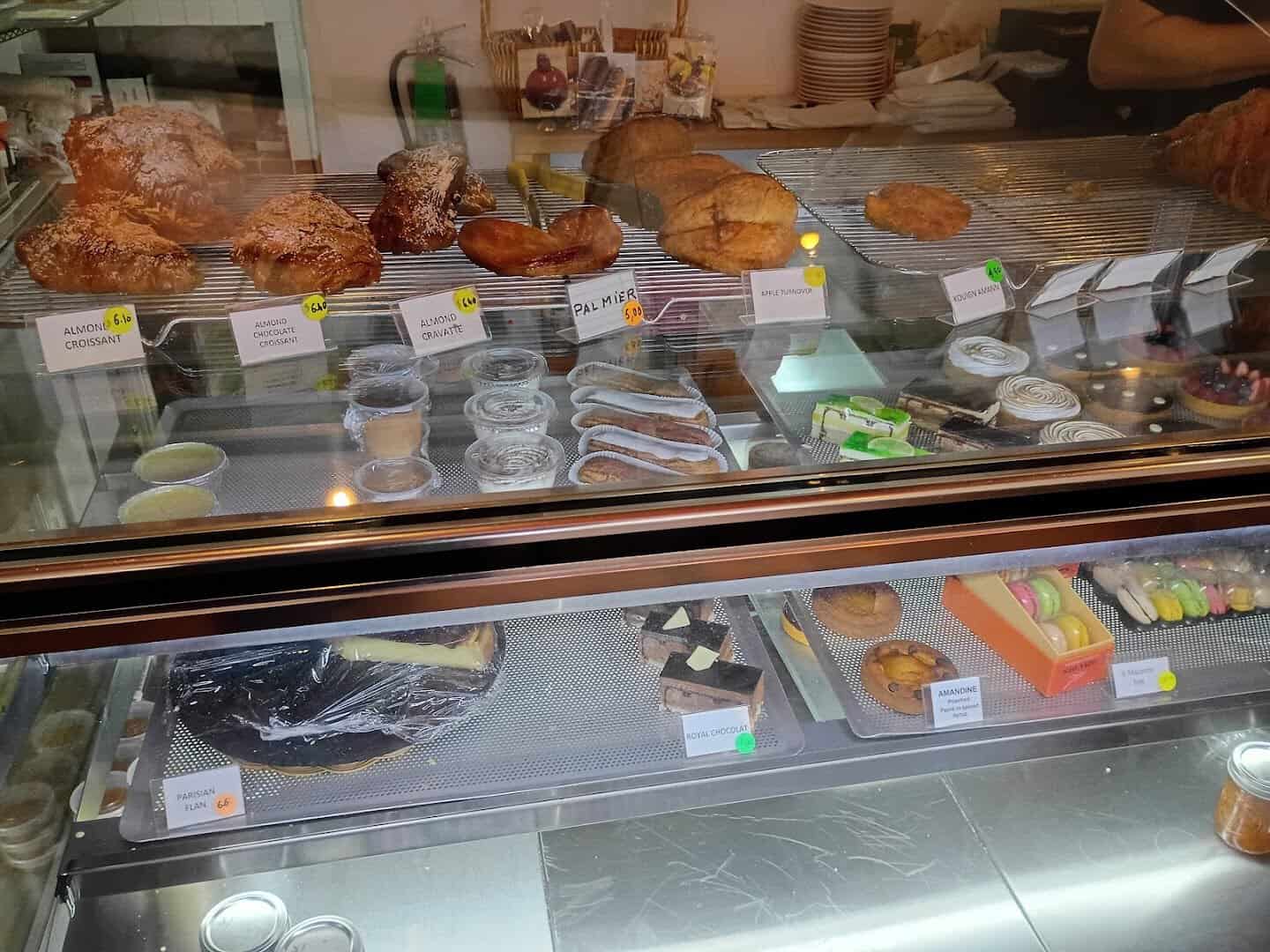 Croissants and viennoiserie in the display case at La Boulangerie in San Antonio