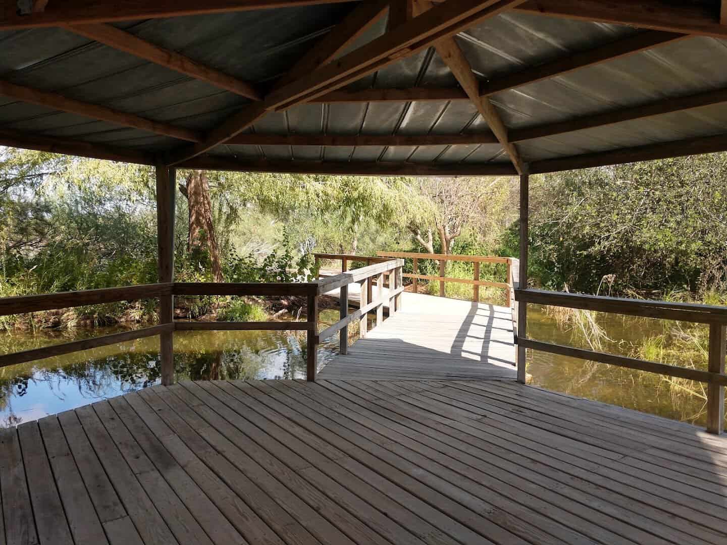 Covered viewing dock over the pond at Edinburg Scenic Wetlands in Edinburg, Texas