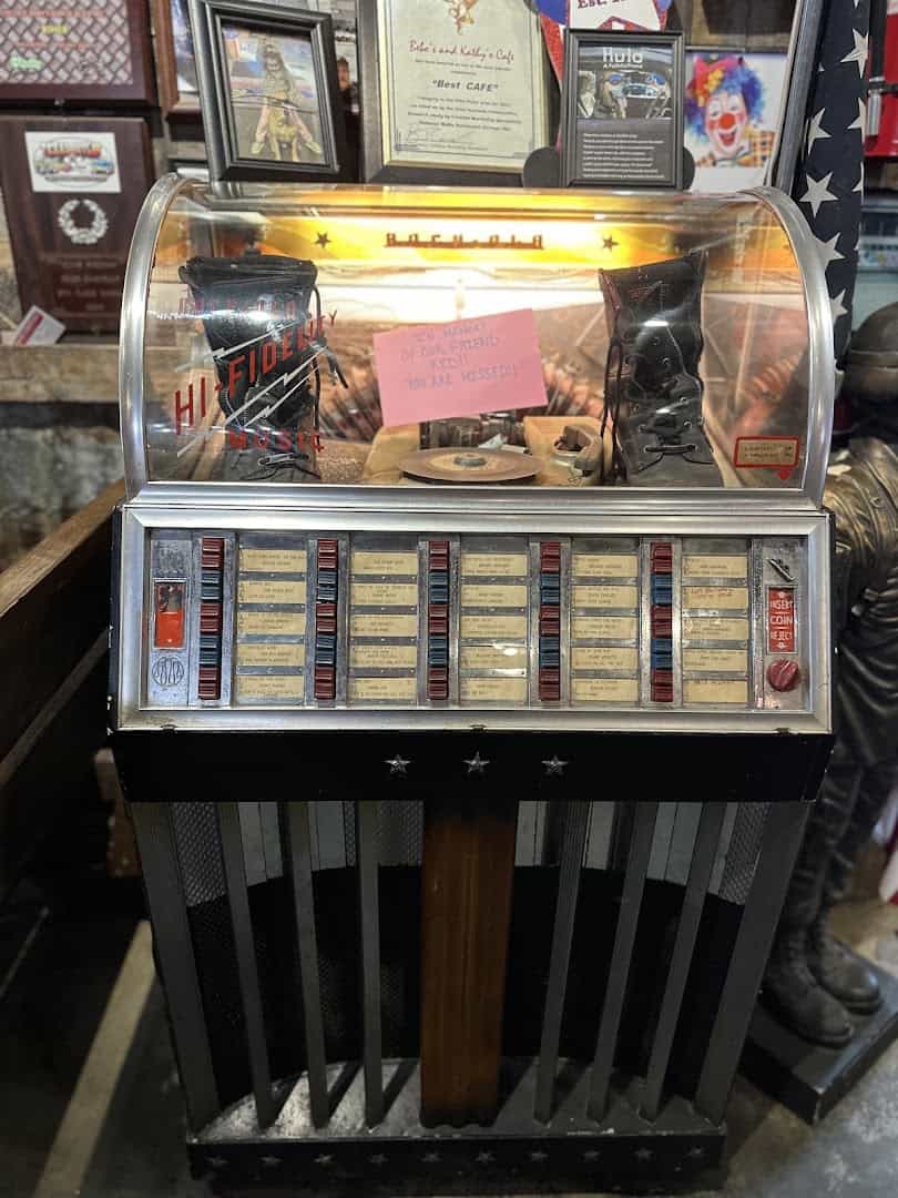 A vintage jukebox surrounded by memorabilia at Bebo's and Kathy's Cafe in Pilot Point, Texas