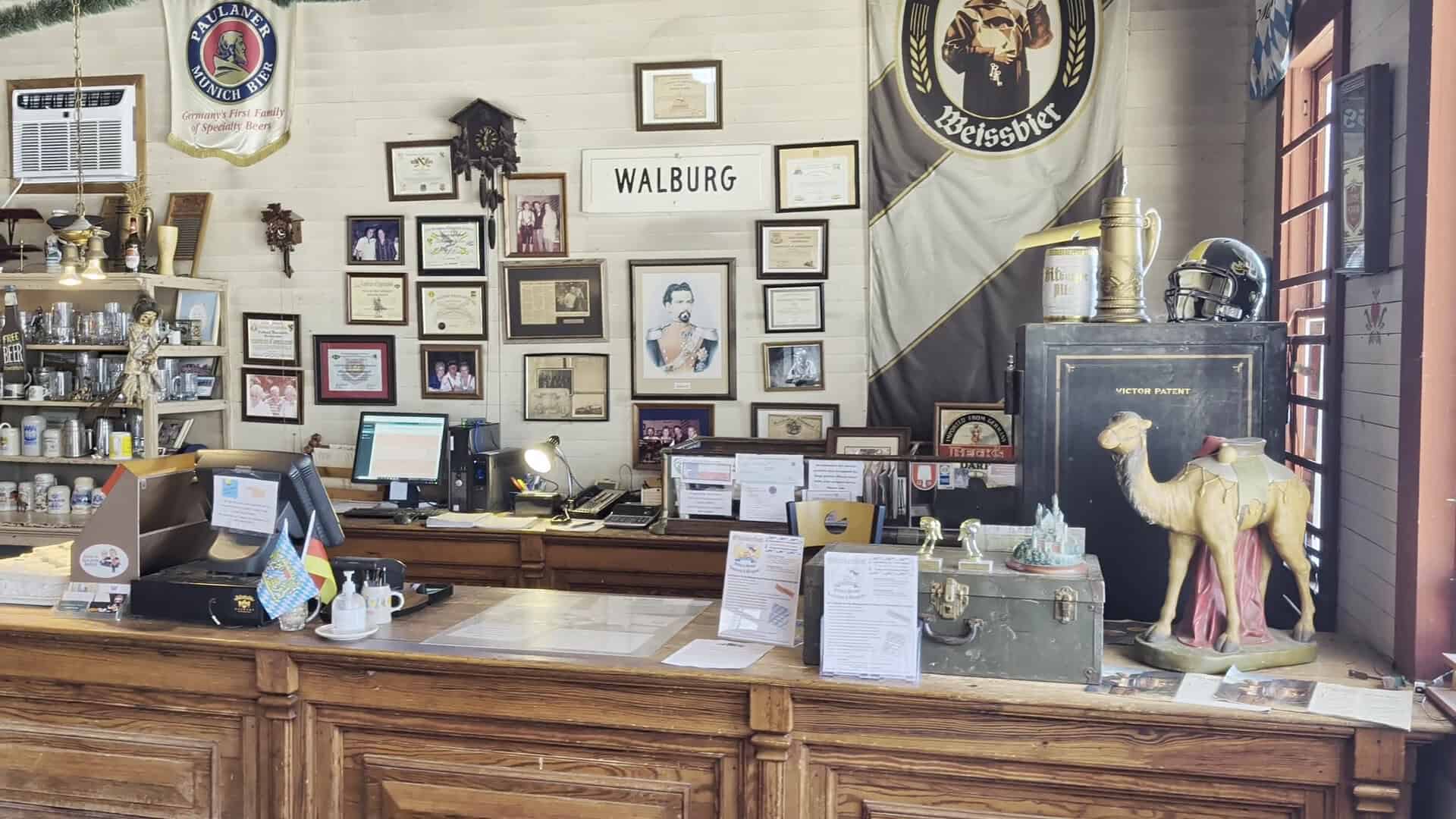 Interior counter and Walburg sign inside the German restaurant in Walburg, Texas