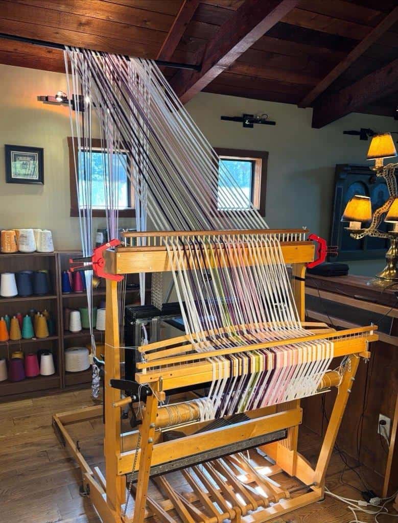 A floor weaving loom inside The Quilted Skein in La Grange, Texas
