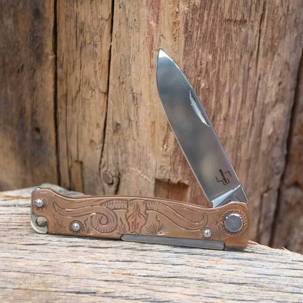 Western folding pocketknife with longhorn engraving at Teskey's in Weatherford, Texas