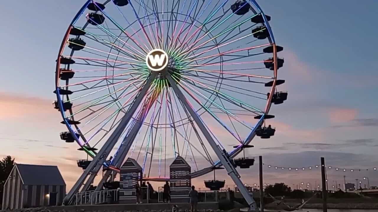 The colorful Wheeler Ferris Wheel lit at dusk in Oklahoma City