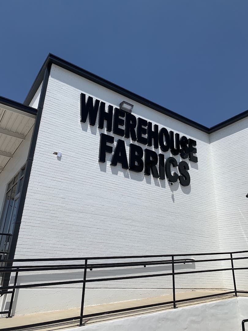 Exterior sign of the Wherehouse Fabrics warehouse in Dallas