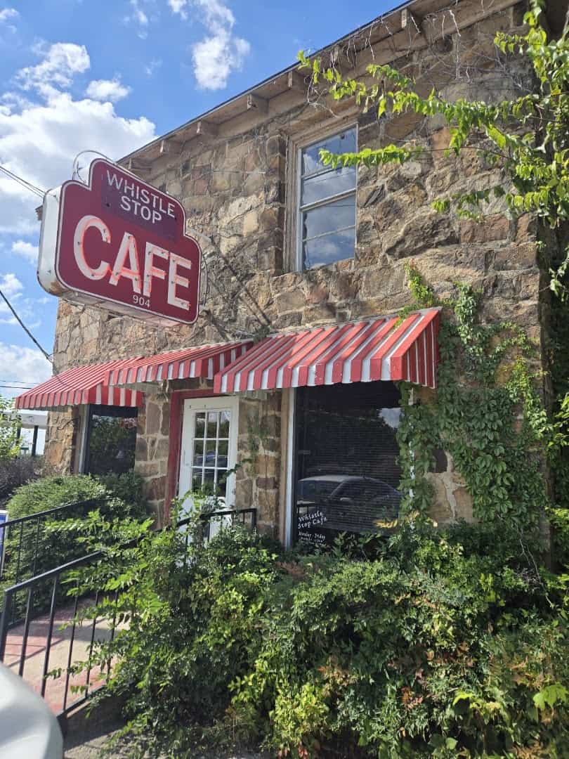 Whistle Stop Cafe storefront and sign in Decatur, Texas