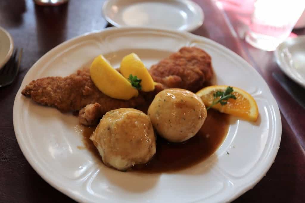 Golden Wiener schnitzel with potato dumplings at Alpine Haus in New Braunfels, Texas