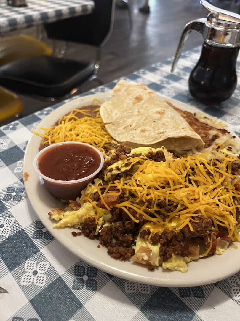Migas plate with eggs and tortilla strips at Wimberley Cafe in Wimberley, Texas