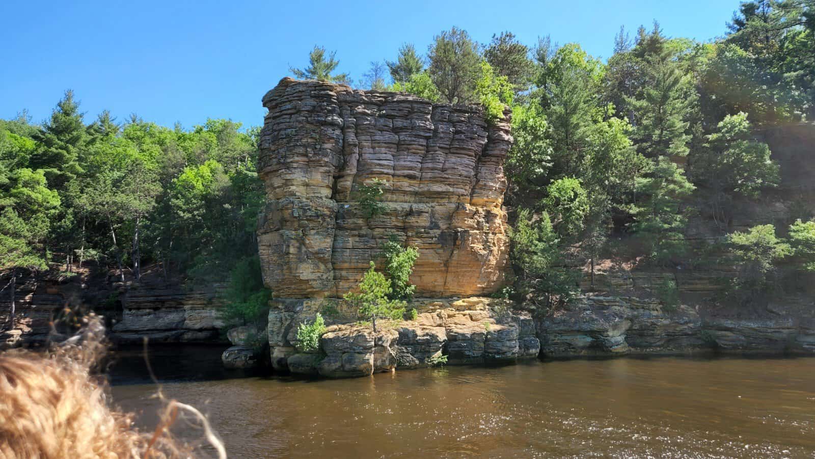 Sculpted sandstone cliffs rising from the Wisconsin River at Wisconsin Dells