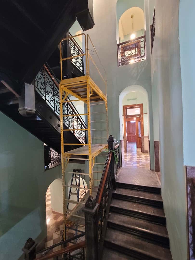 Winding cast iron staircase inside the restored Wise County Courthouse atrium