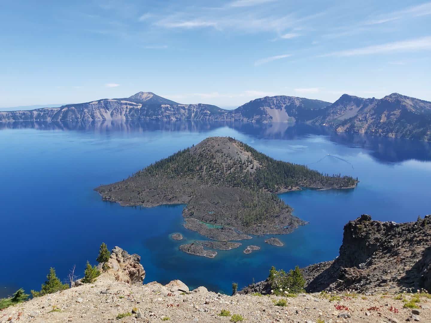 Wizard Island in the deep blue caldera of Crater Lake, Oregon