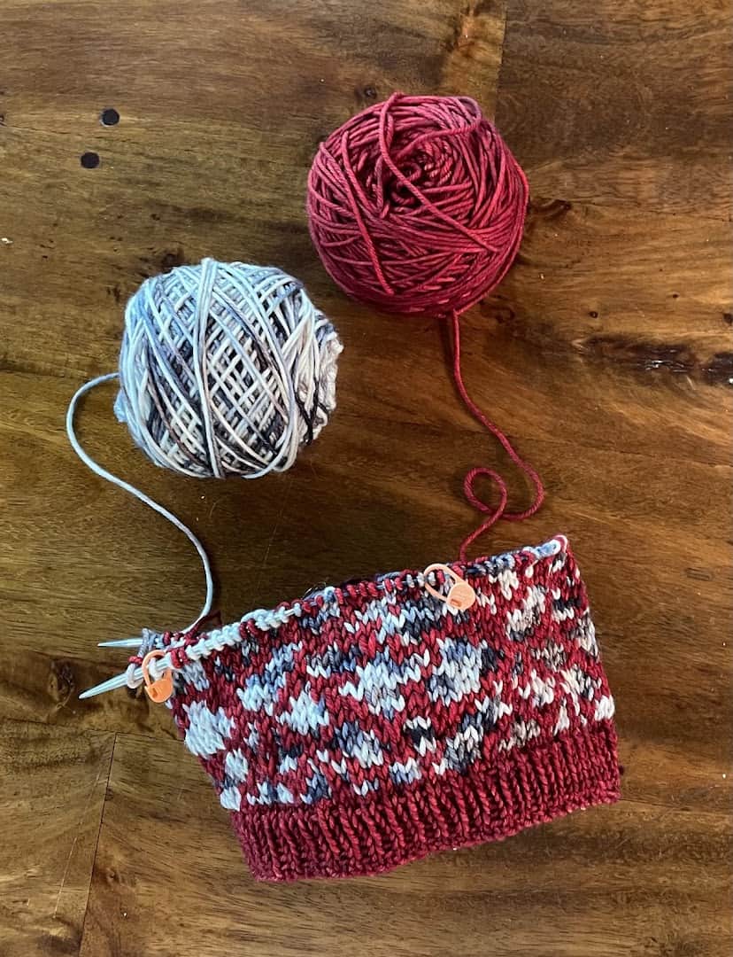 Balls of yarn with a knitted cowl at The Quilted Skein in La Grange, Texas
